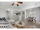 Open floor plan featuring a cozy living area seamlessly connected to the dining and kitchen spaces at 9080 Gale Blvd # 4, Thornton, CO 80260