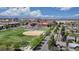 Aerial view showcasing proximity to athletic fields, tree-lined streets and educational facilities at 3031 W 20Th Ave, Denver, CO 80211