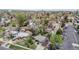 An aerial view highlighting the property's neighborhood, mature trees, and proximity to local amenities at 3031 W 20Th Ave, Denver, CO 80211