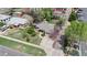An aerial view of the neighborhood featuring a home with a gray roof and a quaint front yard at 3031 W 20Th Ave, Denver, CO 80211