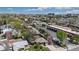 Expansive aerial view of neighborhood streets, mature trees and the home's proximity to local amenities and city skyline at 3031 W 20Th Ave, Denver, CO 80211