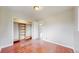Bedroom with hardwood floors and closet at 3031 W 20Th Ave, Denver, CO 80211