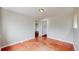 Bedroom showcasing neutral walls and classic wood floors at 3031 W 20Th Ave, Denver, CO 80211
