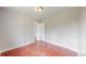 Bedroom with neutral walls, bright window, and classic wood floors at 3031 W 20Th Ave, Denver, CO 80211