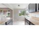 Kitchen featuring granite counters and ample cabinet space at 3031 W 20Th Ave, Denver, CO 80211