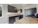 Well-equipped kitchen featuring stainless steel appliances and dark cabinetry at 3031 W 20Th Ave, Denver, CO 80211