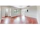 Expansive room with natural light highlighting hardwood floors and neutral walls, perfect for customizing to your taste at 3031 W 20Th Ave, Denver, CO 80211