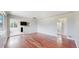 Spacious living room with hardwood floors, bright window, and an open layout at 3031 W 20Th Ave, Denver, CO 80211