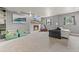Basement area with fireplace, gray walls, neutral carpet, and seating at 4879 S Johnson St, Littleton, CO 80123