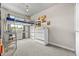 Bedroom featuring a loft bed, carpeted floor, and natural light at 4879 S Johnson St, Littleton, CO 80123