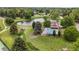 Community pool and lake surrounded by lush trees in a residential area at 6128 S Coventry E Ln, Littleton, CO 80123
