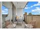 Cozy balcony featuring comfortable seating and string lights, perfect for relaxing outdoors at 799 Dahlia St # 503, Denver, CO 80220