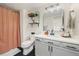 Well-lit bathroom with modern fixtures, ample counter space, and stylish decor at 799 Dahlia St # 503, Denver, CO 80220