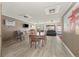 An airy dining room featuring tile floors, access to pool, and comfortable seating at 799 Dahlia St # 503, Denver, CO 80220
