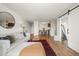 Spacious living room with an open layout, seamlessly connecting to the dining and kitchen areas at 799 Dahlia St # 503, Denver, CO 80220