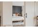 Stylish bedroom featuring modern paneling, soft rug, and a bright atmosphere at 799 Dahlia St # 503, Denver, CO 80220