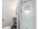 Newly remodeled bathroom featuring white subway tile in the shower and modern fixtures at 2845 Eaton St, Wheat Ridge, CO 80214