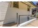 Exterior view of home showing windows and basement access at 2845 Eaton St, Wheat Ridge, CO 80214