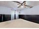 Cozy bedroom featuring neutral carpet, painted walls and modern ceiling fan at 12425 Bellaire Dr, Thornton, CO 80241