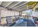 Inviting covered patio with comfortable seating and stylish outdoor decor at 12425 Bellaire Dr, Thornton, CO 80241