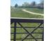 Scenic view of a walking trail meandering through lush greenery and open spaces at 12425 Bellaire Dr, Thornton, CO 80241
