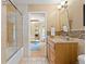 Bathroom featuring a tiled shower and view into the exercise room at 1952 Columbine Ct, Golden, CO 80401