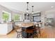 Kitchen featuring a large island with seating, granite countertops, and stainless steel appliances at 1952 Columbine Ct, Golden, CO 80401