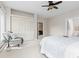 Bright main bedroom with ensuite bathroom, closet and a comfortable seating area at 1952 Columbine Ct, Golden, CO 80401