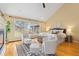 Main bedroom boasts a fireplace, sitting area, vaulted ceilings, and windows with great views at 1952 Columbine Ct, Golden, CO 80401