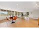 Large recreation room featuring big windows and game table with stunning views at 1952 Columbine Ct, Golden, CO 80401