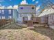 Backyard featuring a deck with stairs down to a patio area at 8047 Lee Ct, Arvada, CO 80005