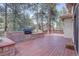 Outdoor deck with built-in BBQ area and ample space for entertaining or relaxing in an outdoor setting at 2828 Keystone Dr, Evergreen, CO 80439