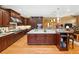 This kitchen has lots of cabinet storage, a large island with seating, and stainless steel appliances at 2828 Keystone Dr, Evergreen, CO 80439