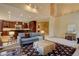 Open-concept living area featuring a spacious layout, high ceilings, and modern furnishings at 2828 Keystone Dr, Evergreen, CO 80439