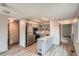 Well-equipped kitchen features stainless steel appliances, granite countertops, and modern flooring at 400 S Balsam St, Lakewood, CO 80226