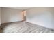 View of the living room highlights the modern flooring and neutral color scheme at 400 S Balsam St, Lakewood, CO 80226