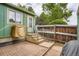 Back patio with brick pavers and steps offers an inviting outdoor space at 400 S Balsam St, Lakewood, CO 80226