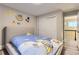 Charming bedroom with a closet and a calming ambiance, perfect for relaxation at 6401 S Millbrook Way, Aurora, CO 80016