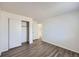 Neutral bedroom with wood-look floors and closet at 2735 S Uravan St, Aurora, CO 80013