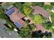Aerial shot of a home with solar panels and lush, mature landscaping providing shade and privacy at 1339 Quince St, Denver, CO 80220