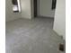Neutral bedroom with gray carpet, neutral walls, closet with shelving, and two windows at 1339 Quince St, Denver, CO 80220
