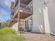 Exterior shot of the back of the building showing 3 levels and stone landscaping at 17505 E Mansfield Ave # 1412R, Aurora, CO 80013
