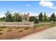 Entrance to University of Colorado Boulder is marked by a sign and features a beautiful brick building in the background at 911 Lincoln Pl, Boulder, CO 80302