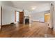 Spacious living room featuring beautiful hardwood floors and a cozy fireplace at 911 Lincoln Pl, Boulder, CO 80302