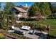 Backyard view features tiered gardens and an outdoor seating area at 6483 S Prince St, Littleton, CO 80120
