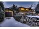 Beautiful exterior of a home with a two-car garage and snow-covered landscaping at 6483 S Prince St, Littleton, CO 80120
