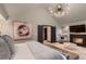Spacious main bedroom featuring fireplace and ample natural light at 6483 S Prince St, Littleton, CO 80120