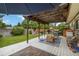 Outdoor back deck with patio furniture, grill, string lights, and a hammock for relaxing at 3709 S Fairplay Way, Aurora, CO 80014