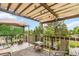 Outdoor deck with awning and seating arrangement at 3709 S Fairplay Way, Aurora, CO 80014