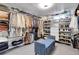Large walk-in closet with ample shelving and hanging space at 1600 S Dahlia St, Denver, CO 80222